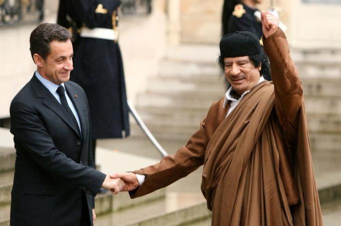 File photo of France''s President Nicolas Sarkozy greeting Libyan leader Muammar Gaddafi in Paris