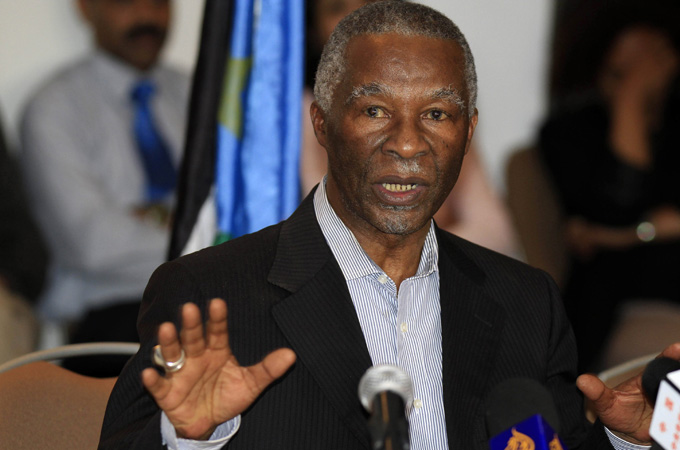 Former South African President Mbeki speaks during a meeting between Sudanese Defence Minister Hussein and his South Sudan counterpart Nyuon in Ethiopia''s capital Addis Ababa