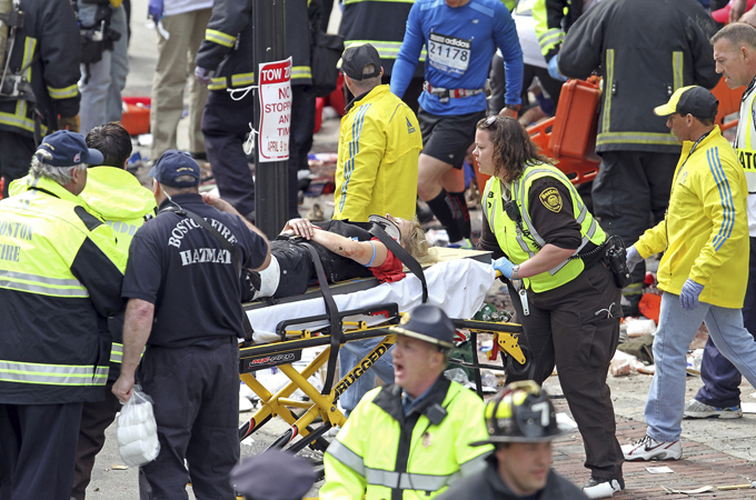 The aftermath of a bomb blast near the Boston Marathon finish line, April 14, 2013