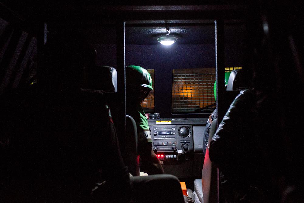 <p>A convoy of AMISOM Formed Police Units (FPU) in armoured vehicles leave the national stadium to rendezvous with their Somali counterparts for a late night patrol in Mogadishu. </p>
