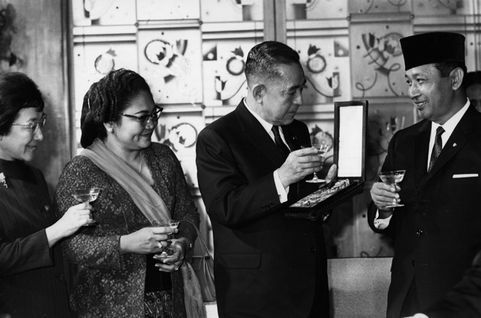 Suharto (right) launched an attack on Indonesia's Communist Party on October 1, 1965 [Getty Images]