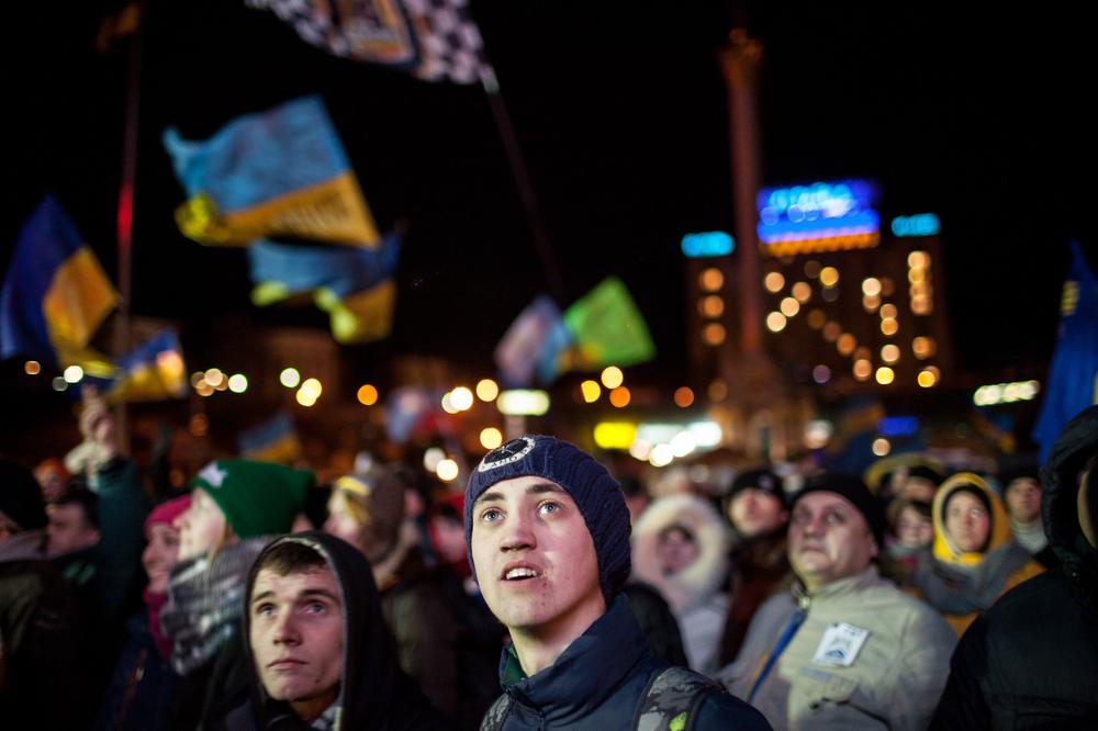 Protesters watch a live performance at Independence Square.