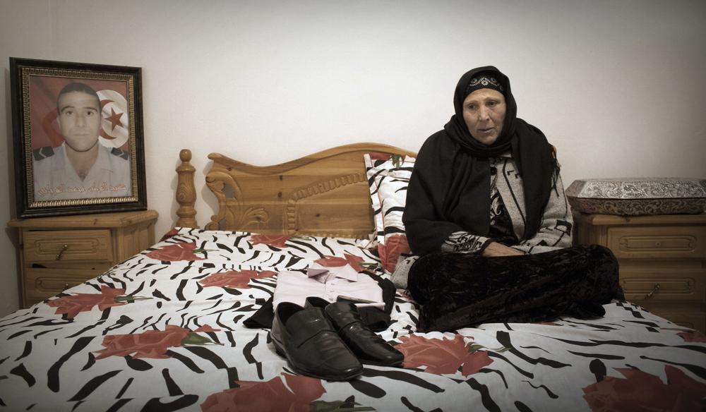 Khemissa Oueslati is the mother of Mohamed, a policeman who was shot dead at age 23 while inspecting a vehicle at a checkpoint. Had he lived, Mohamed would have married his fiancee later this year.