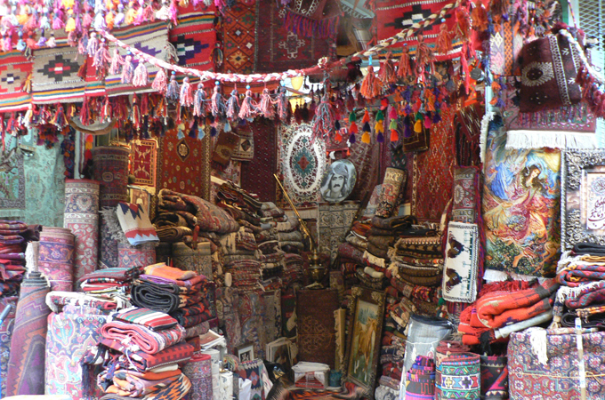 It is getting harder for Iraqi-Kurdish vendors to find stock of genuine Kurdish handicrafts [Lara Fatah/Al Jazeera]