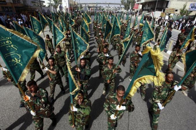 Iraq's multi-ethnic, multi-religious society cannot rely on a goverment that exclusively represents the interests of one component over all others, writes Albogami [AFP]