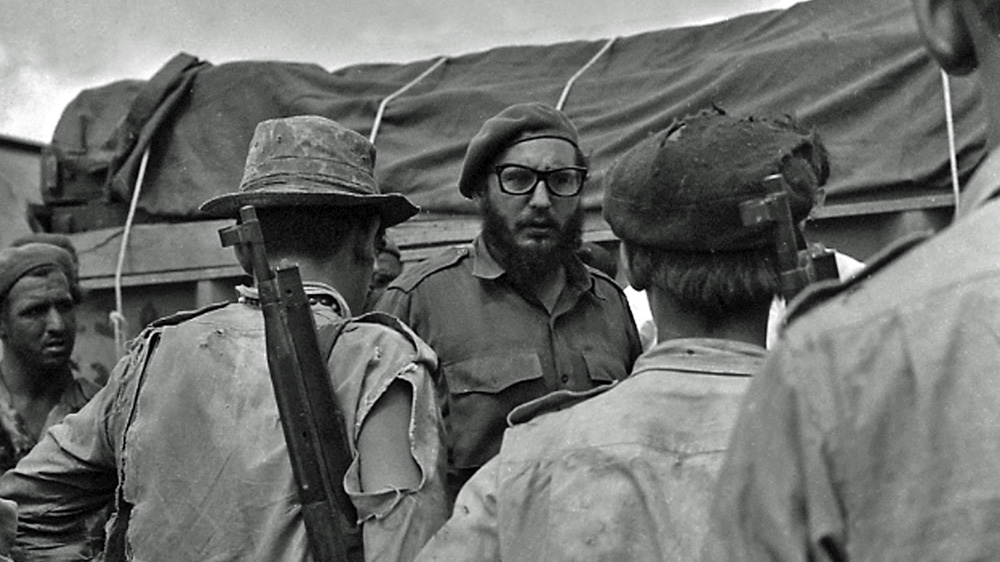 Castro (C) talks to soldiers during the CIA-backed Bay of Pigs invasion [Reuters]