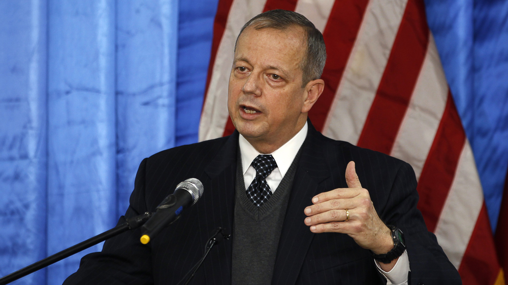 Retired US General John Allen speaks to the media during a news conference at the US embassy in Baghdad on January 14, 2015