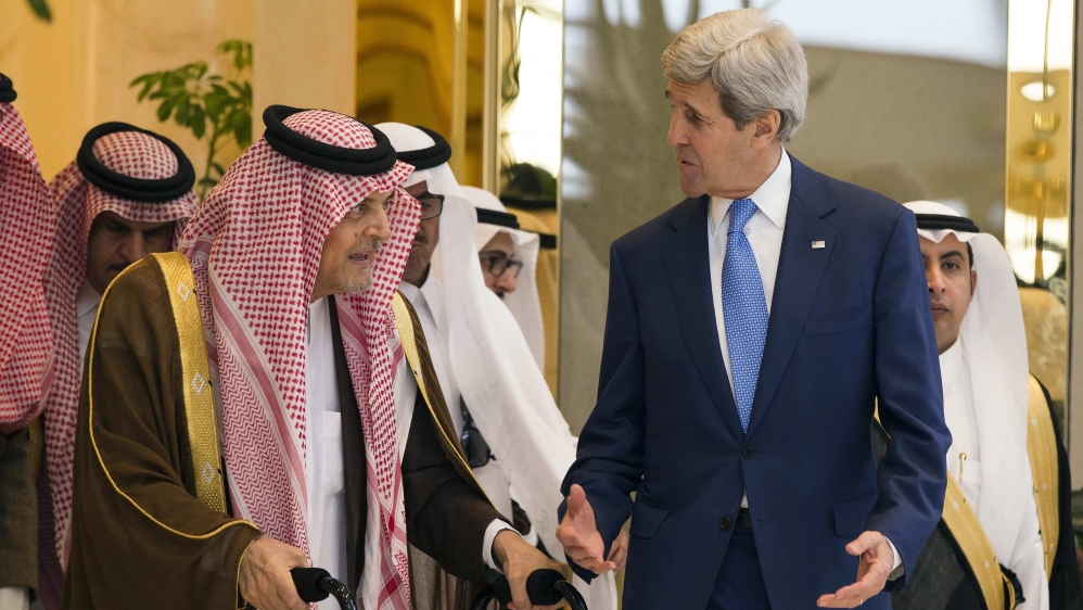 U.S. Secretary of State Kerry walks to a news conference with Saudi Arabia''s Foreign Minister Saud bin Faisal bin Abdulaziz Al Saud in Riyadh