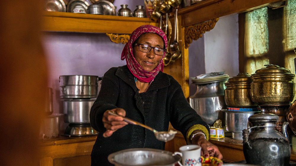 Sherab Dolma runs a homestay in Saspochey village and speaks of snow leopards as her jewels. [Felix Gaedtke/NowHere Media /Al Jazeera]