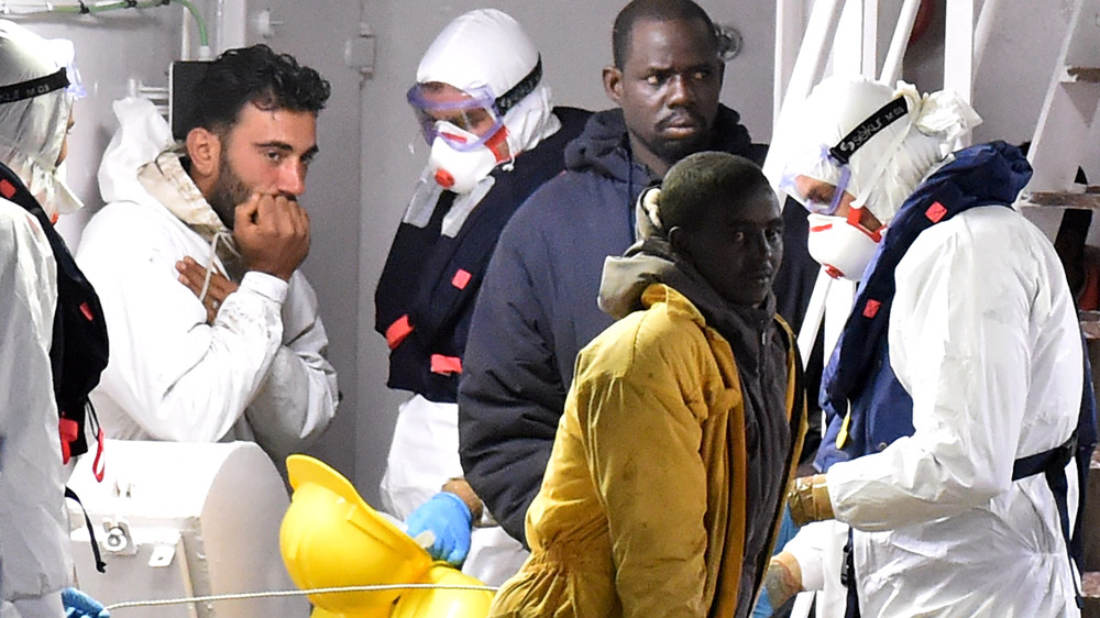 Mohammed Ali Malek (L) was identified by survivors as the captain of the boat and arrested after the shipwreck [Getty Images]