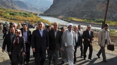 Iranian officials arrive at the construction site of a joint hydroelectric power plant near the Armenian-Iranian border in 2012 [AFP]