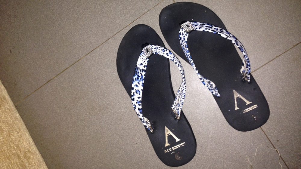 Titi's latest acquisition is a pair of slippers given to her by Mummy's niece who was visiting [Al Jazeera]