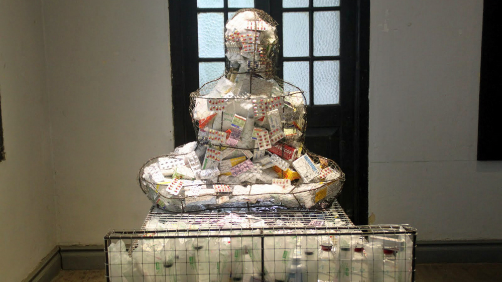 Htein Lin's work explores the idea of freedom [Mark Fenn/Al Jazeera]