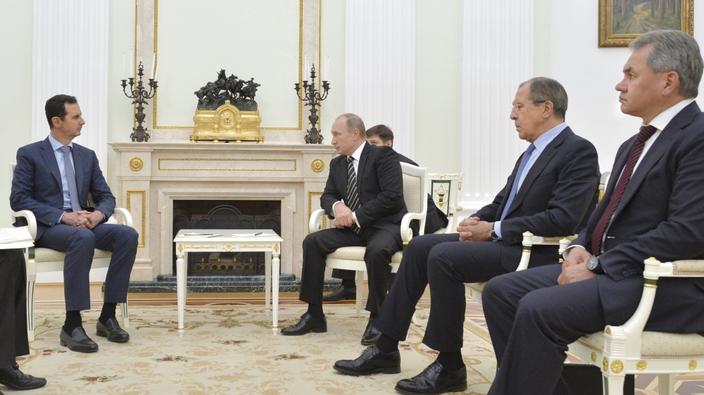 Russian President Putin, Foreign Minister Lavrov, Defence Minister Shoigu and Syrian President Assad attend a meeting at the Kremlin in Moscow