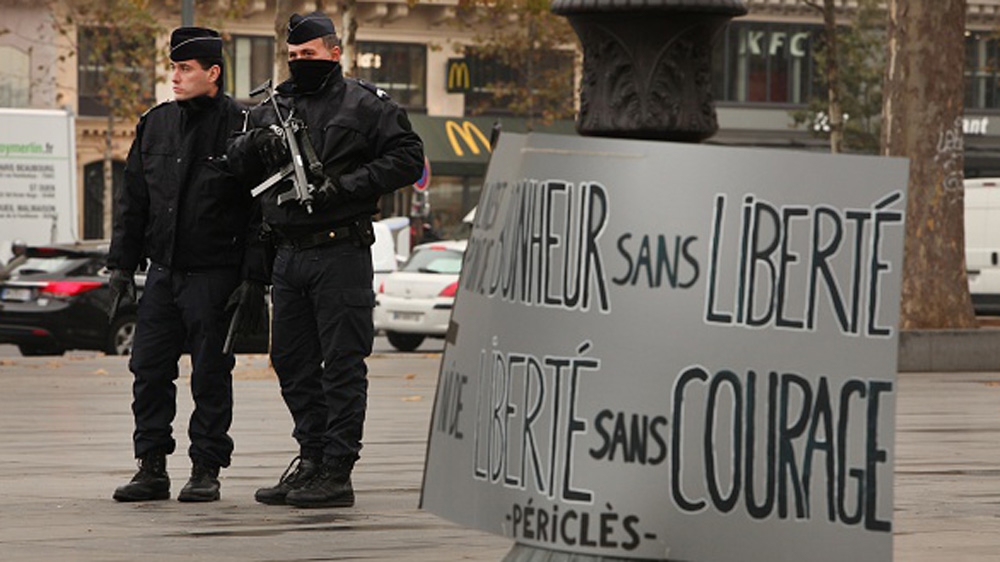 The police patrol at the Place de la Republique as the public gather in memory of the 130 victims of the Paris terrorist attacks on November 27 [Getty]
