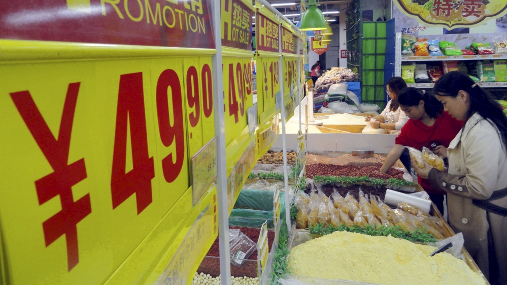 Customers choose products at a supermarket in Suzhou