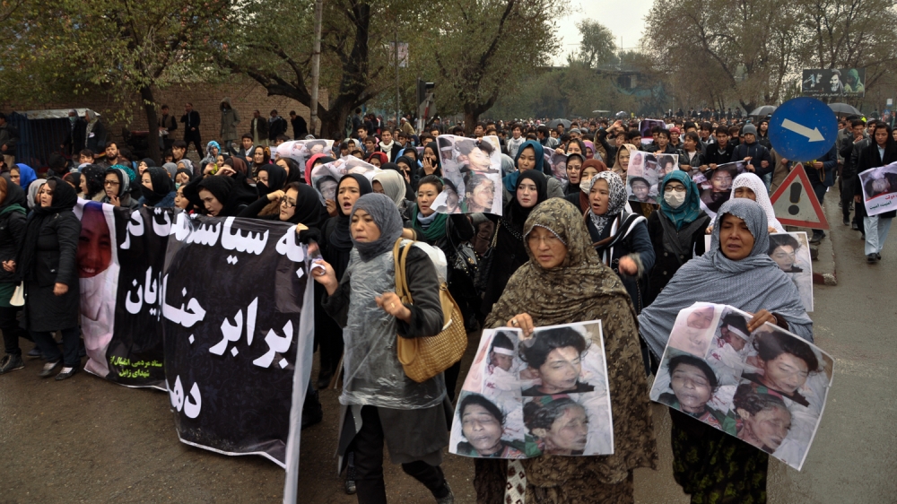  Thousands of Afghans marched through the Afghan capital in the largest demonstration in recent history (Maryam Mehtar/Al Jazeera English)