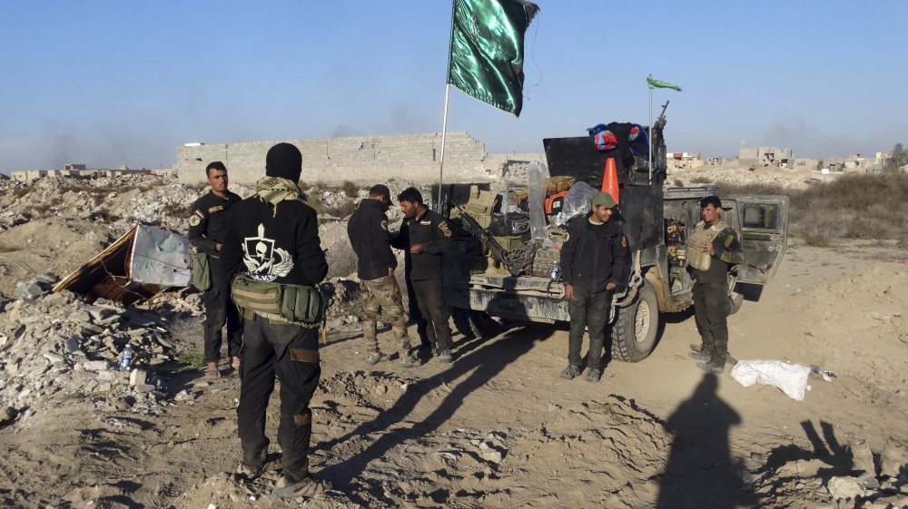 Iraqi government forces faced roadside bombs and suicide bombings during their advance to the centre of Ramadi [AP]
