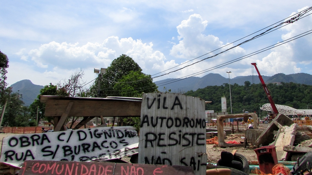 A sign at the entrance to the community says