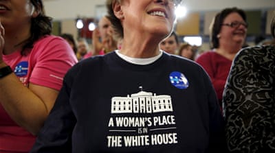 Wendy Keen, of Iowa City, listens as Clinton speaks during the Women for Hillary Get Out the Caucus event, January 24, [Reuters]