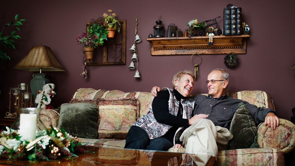 Marilyn and Larry Wood. Larry has lived on the lake since his father first bought waterfront land in 1947 [Ryan Edwardson/Al Jazeera] 