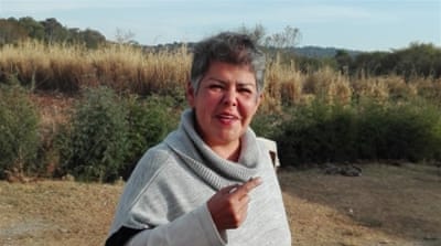 Angelica Escalante, 48, gives a tour of CeVIDA, the recovery clinic in Michoacan, where she works as the HR director [Tim MacGabhann/Al Jazeera]