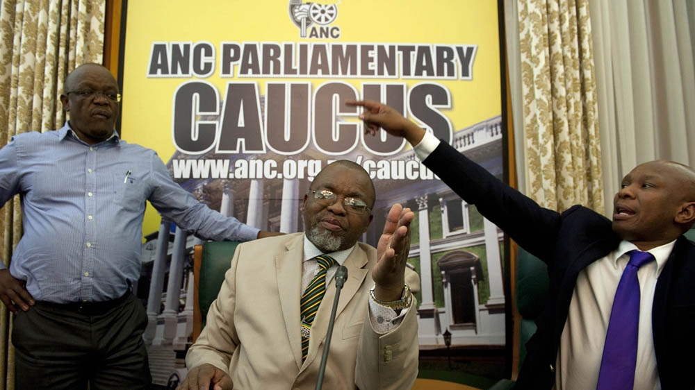 ANC Secretary-General Gwede Mantashe, right, and newly appointed spokesperson Zizi Kodwa hold a media briefing in parliament [David Harrison/Al Jazeera] 