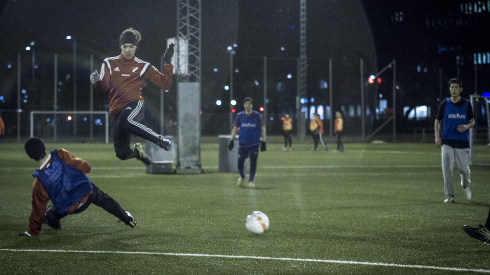 The boys mix Swedish, English and other languages as they play [Jan Soja/Al Jazeera]