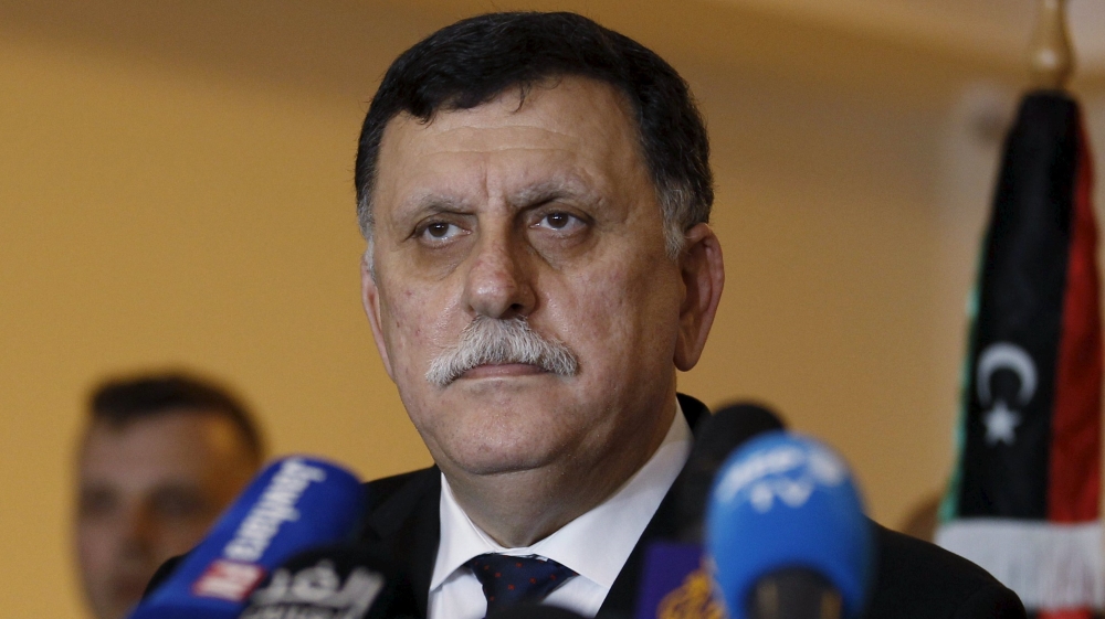 Libyan prime minister-designate under a proposed National Unity government Fayez Seraj attends a joint news conference with European Union foreign policy chief Federica Mogherini in Tunis, Tunisia
