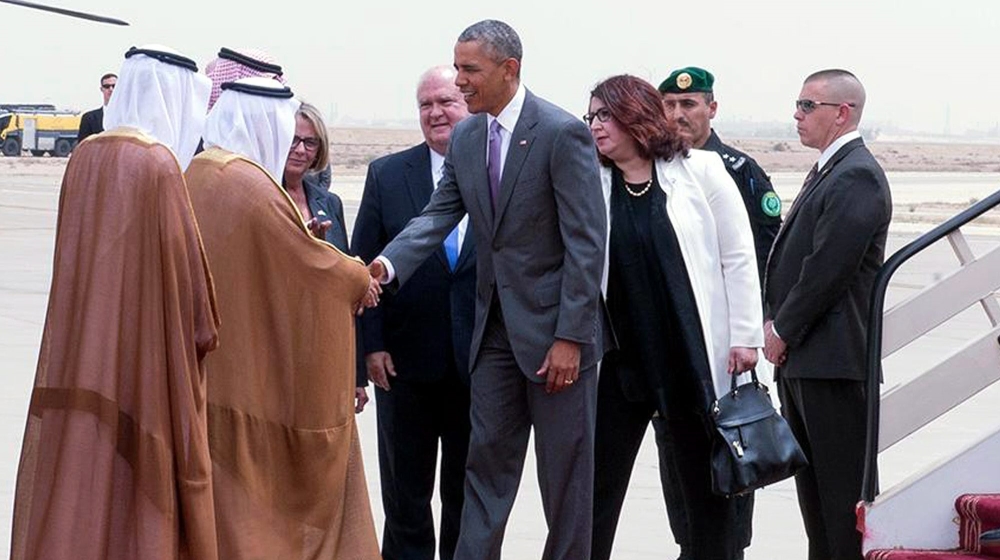 US President Barack Obama being received by Prince Faisal bin Bandar bin Abdelaziz al-Saud, Governor of Riyadh, upon arrival at King Khalid International Airport, Riyadh, Saudi Arabia [EPA]