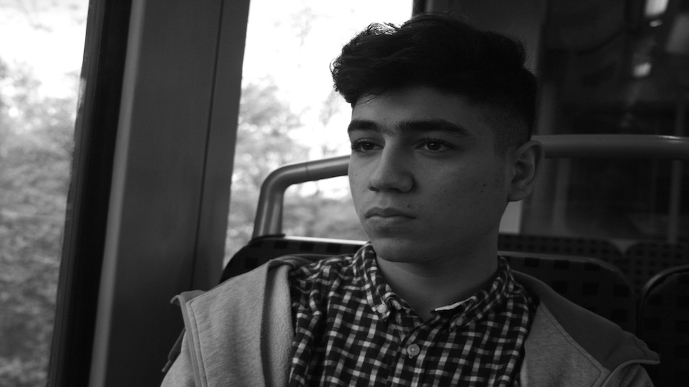 Hamouda has lived in Hamburg since October. His parents, sisters and brother are still in Aleppo [ Caelainn Hogan/Al Jazeera] 