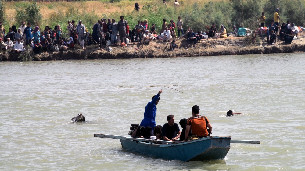 Many fear that ISIL's departure might usher in a new period of suffering for Fallujah's civilian population [EPA]