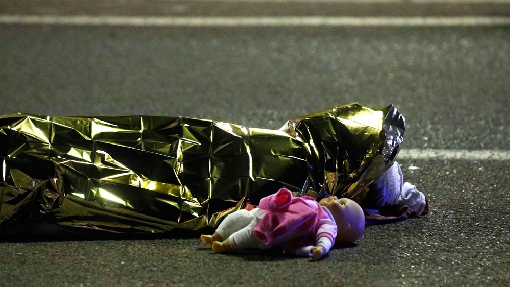
An eyewitness said he saw the driver emerge from the lorry shooting, after ramming into the crowd [Reuters]

