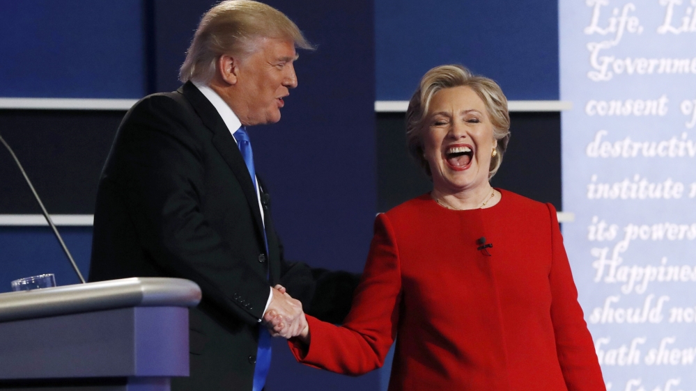 Republican presidential nominee Trump greets Democratic nominee Clinton after first presidential debate at Hofstra University in Hempstead