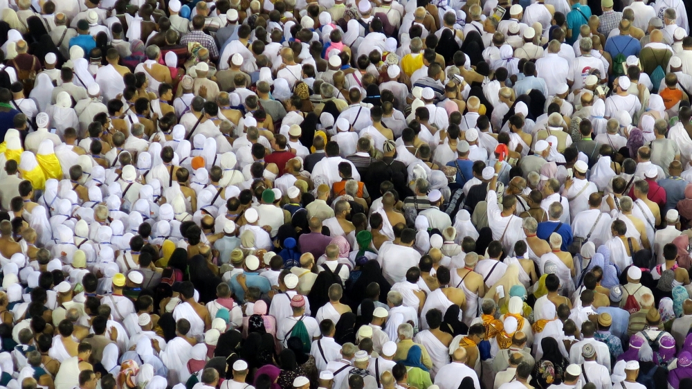 Muslim pilgrims circle the Kaaba at the Grand Mosque in Mecca
