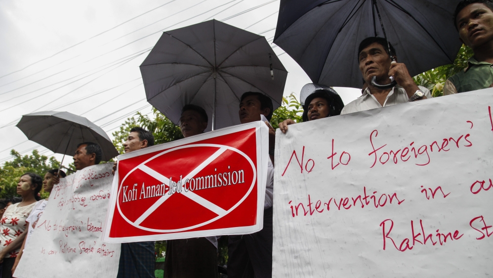Many booed and shouted “No Kofi-led commission” as his convoy left Sittwe’s airport [EPA]