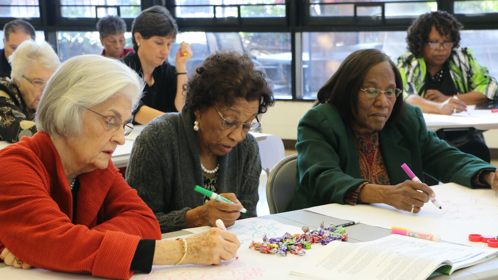 Sunday school students discuss their way to influence their surroundings and society [Julienne Gage/Al Jazeera] 