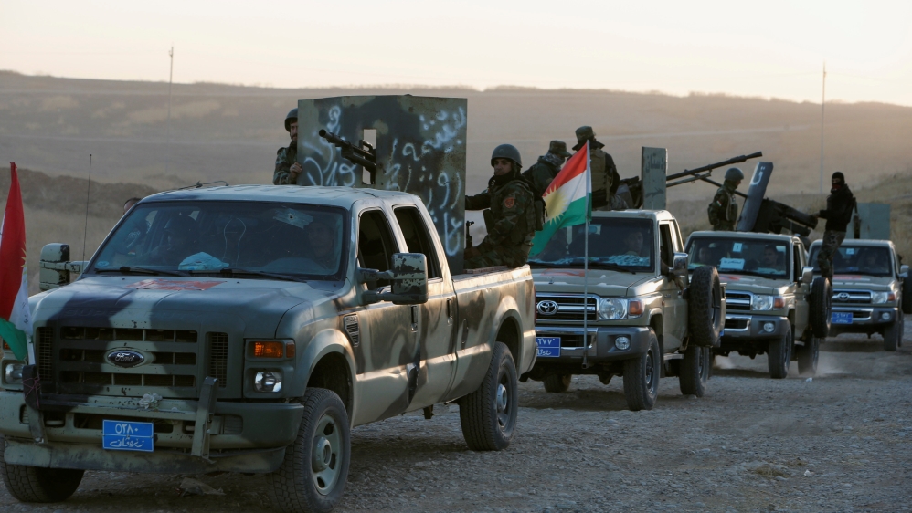Peshmerga forces in the east of Mosul as they prepare to attack ISIL positions [Azad Lashkari/Reuters]