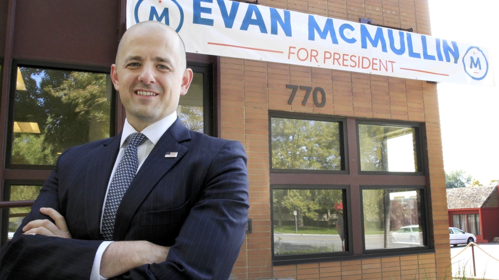 Third party candidate Evan McMullin, an independent, poses for a picture outside his campaign offices in Salt Lake City