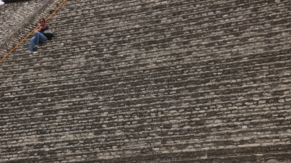 An exposed section of the largest pyramid in the world, the Great Pyramid of Cholula [Ryan Mallett-Outtrim/Al Jazeera] 