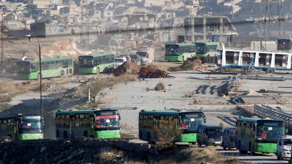 More than 40 vehicles were used in the evacuation of civilians [Reuters]
The evacuation was part of a ceasefire expected to last three days [Malek al-Shimale]
