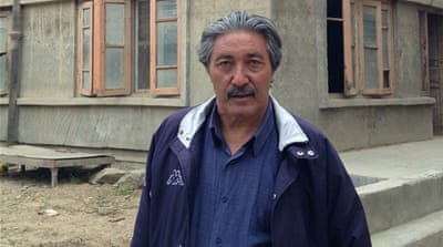 Mohammad Rahim outside his house in Srinagar [Sunaina Kumar/Al Jazeera]