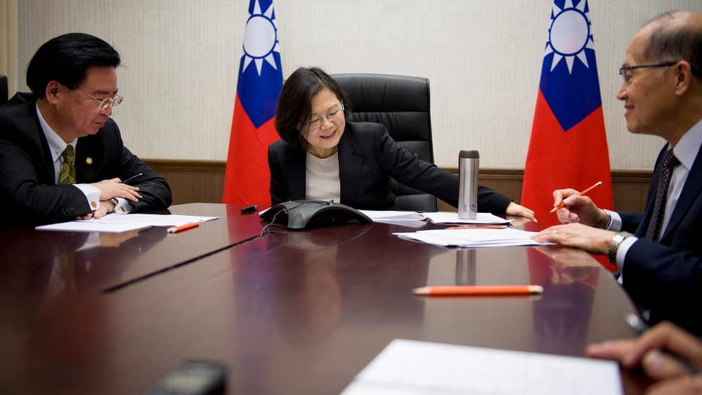 Taiwan''s President Tsai Ing-wen speaks on the phone with U.S. president-elect Donald Trump at her office in Taipei