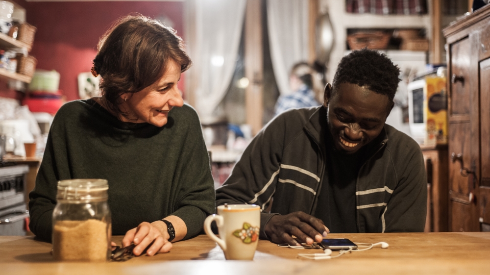 The Calo family provided the refugees they are hosting with psychological assistance, food, and the safety of a home. Nicoletta Calo and Sahiou [Mattia Cacciatori /Al Jazeera]