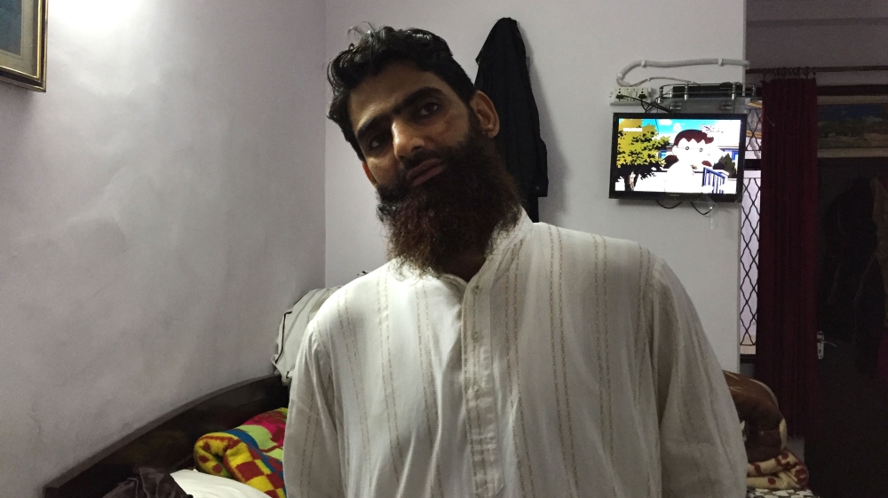 
Shah says that the police stripped him naked and applied electric shocks to his genitals [Sheikh Saaliq/Al Jazeera]
