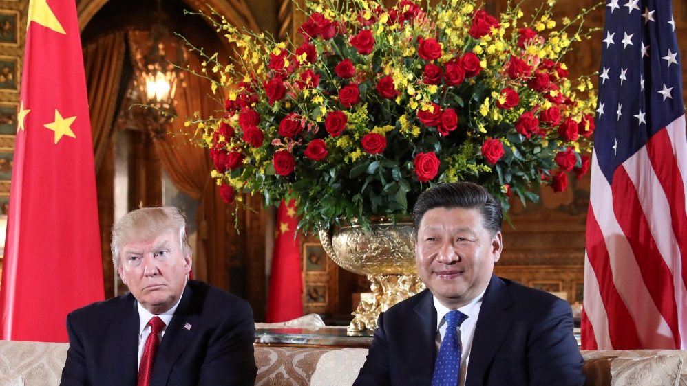 U.S. President Donald Trump welcomes Chinese President Xi Jinping at Mar-a-Lago state in Palm Beach, Florida, U.S.