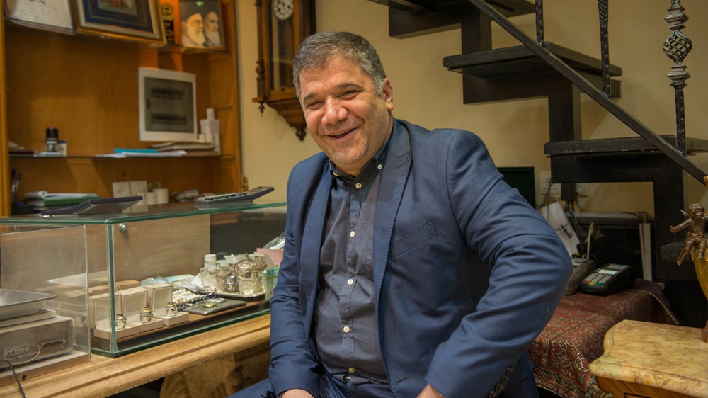 'As long as international debit and credit cards are not operational, tourists can't make many purchases,' says shop owner Sayid Behnam Amin [Wojtek Arciszewski/Al Jazeera]