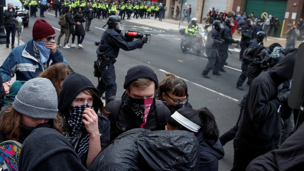 Police are accused of indiscriminate use of tear gas and pepper spray during the Inauguration Day event [Adrees Latif/Reuters]