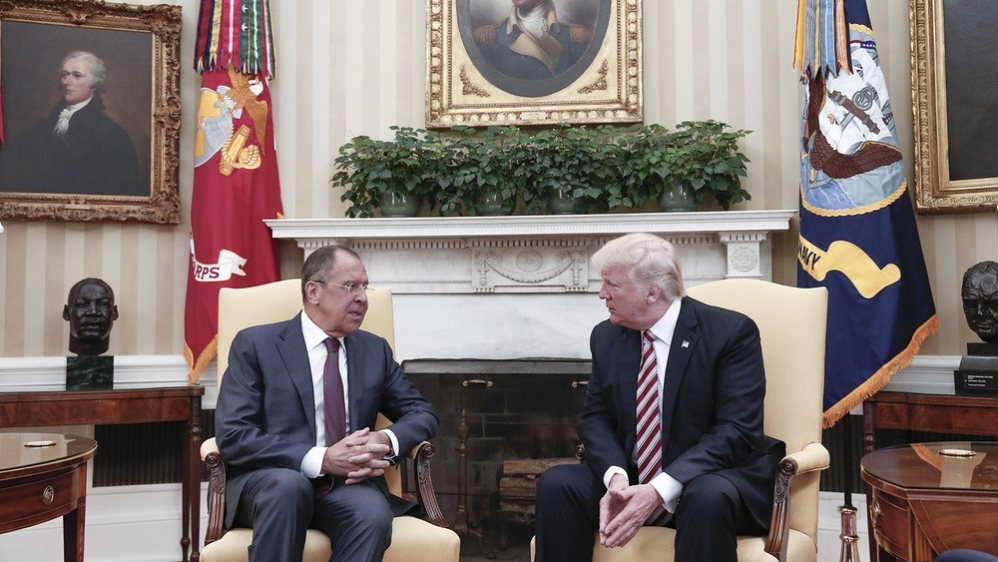 US President Donald Trump, right, revealed classified information to Russian Foreign Minister Sergey Lavrov, left, during their meeting at the White House in May 2017