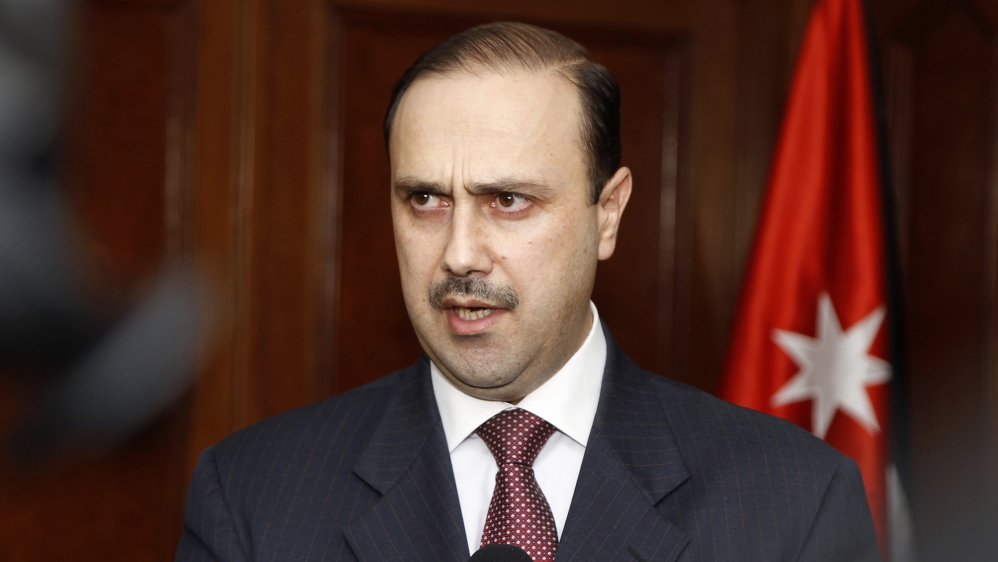 Jordan''s government spokesman Mohammed al-Momani speaks to the media after a closed door meeting of the parliamentary government in the House of Representatives in Amman